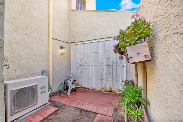 view of patio with ac unit