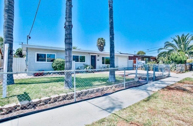 single story home with a front yard