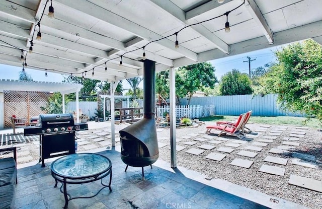 view of patio with a pergola and grilling area