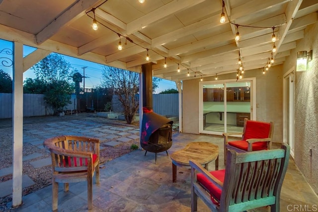 view of patio featuring fence