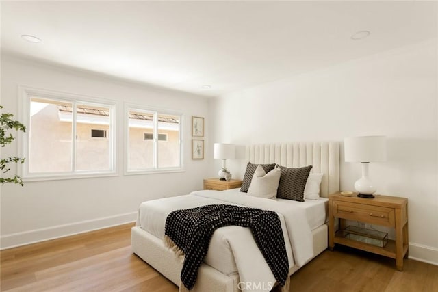 bedroom featuring light hardwood / wood-style flooring