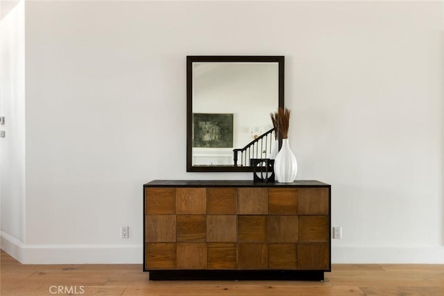 interior details featuring hardwood / wood-style flooring