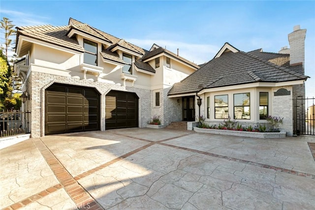 view of front of home with a garage