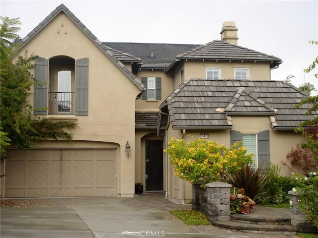 view of front of property featuring a garage