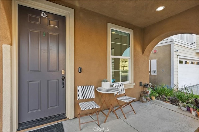 property entrance featuring a garage