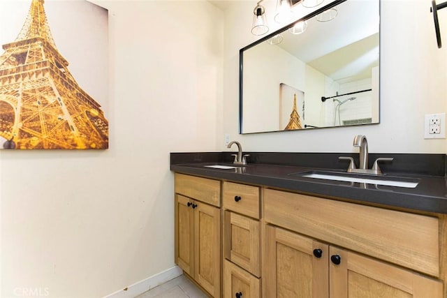 bathroom featuring vanity and tile patterned floors