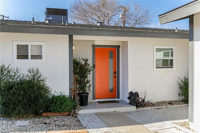 property entrance featuring central air condition unit