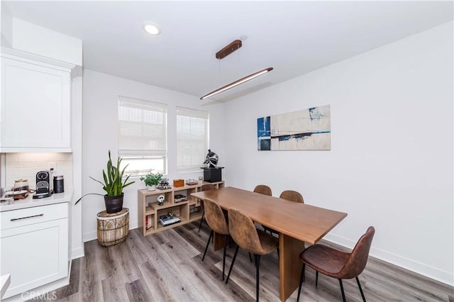 dining room featuring light hardwood / wood-style flooring