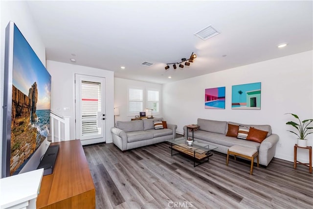 living room with hardwood / wood-style flooring