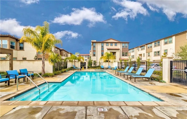 view of pool featuring a patio