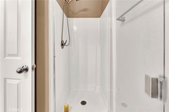 bathroom with a shower