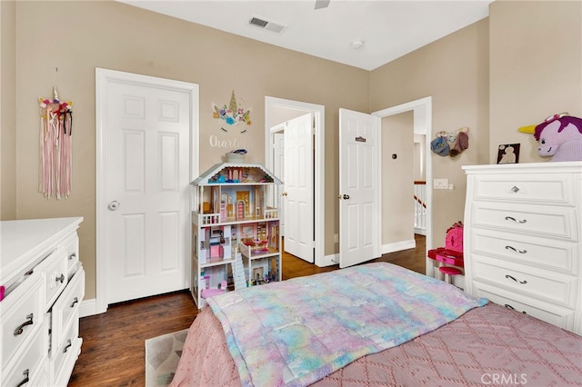 bedroom featuring dark wood-type flooring