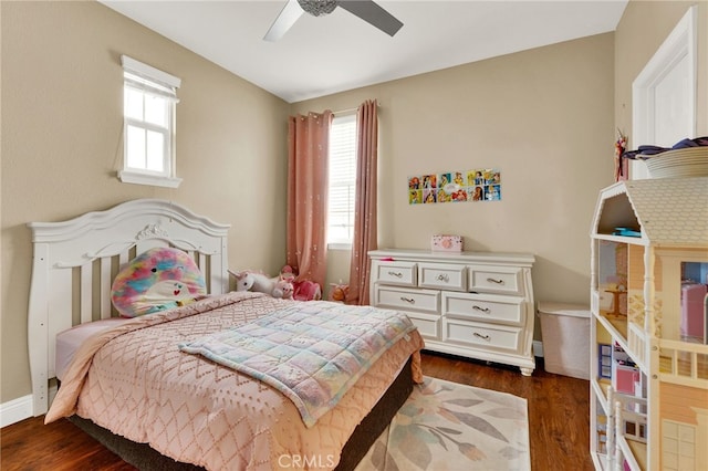 bedroom featuring dark wood-type flooring and ceiling fan