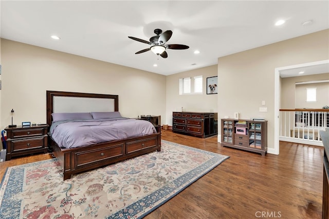 bedroom featuring hardwood / wood-style flooring and ceiling fan