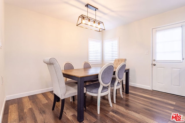 dining area featuring dark hardwood / wood-style flooring