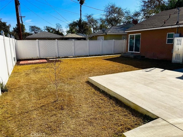 view of yard with a patio area