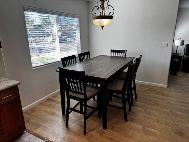 dining room featuring light hardwood / wood-style flooring