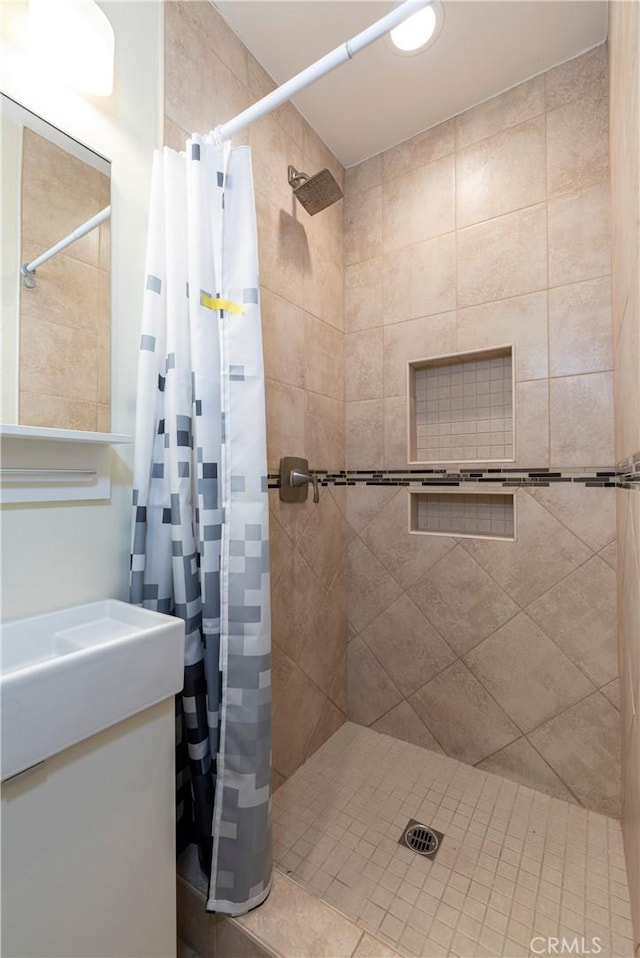 25609 Oakbar Ct, Newhall, CA 91321 - bathroom with a shower stall and vanity