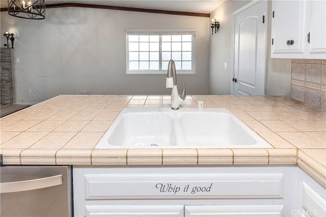 25609 Oakbar Ct, Newhall, CA 91321 - kitchen featuring a sink, dishwasher, white cabinets, and tile countertops
