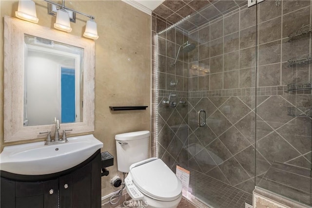 full bathroom featuring vanity, a shower stall, and toilet