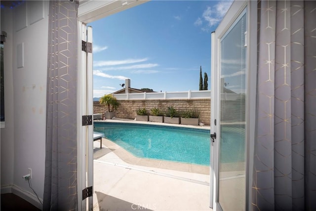 view of pool featuring a fenced in pool