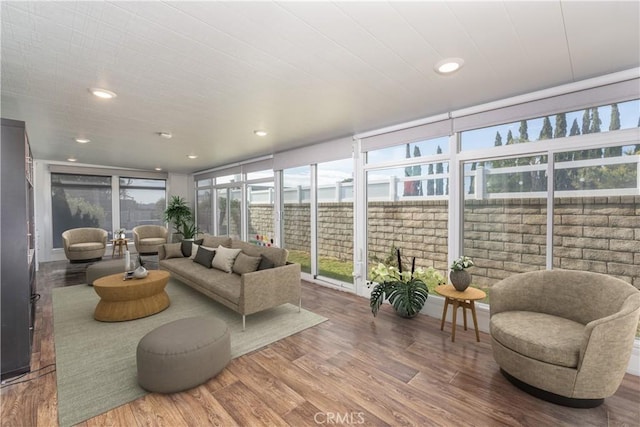 25609 Oakbar Ct, Newhall, CA 91321 - sunroom featuring healthy amount of natural light, wood finished floors, and recessed lighting