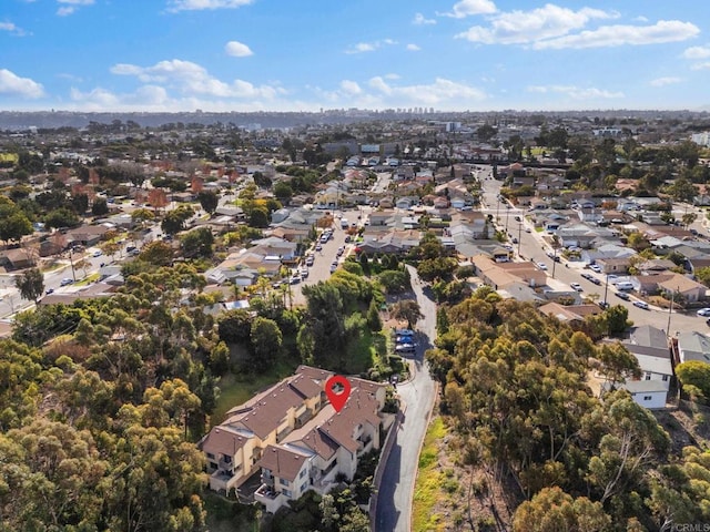 birds eye view of property with a residential view