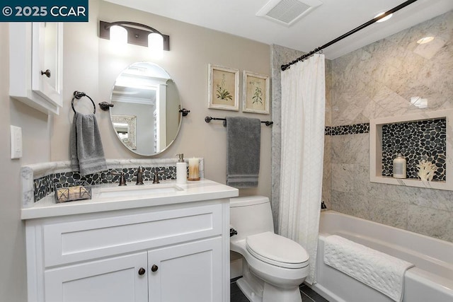 full bathroom featuring shower / bathtub combination with curtain, vanity, and toilet