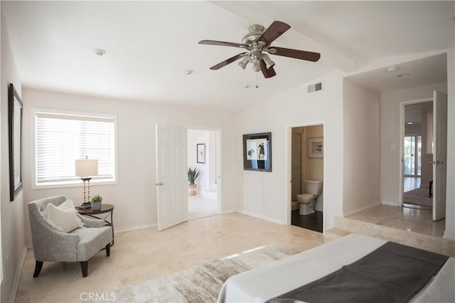 bedroom featuring ensuite bath, lofted ceiling with beams, and ceiling fan