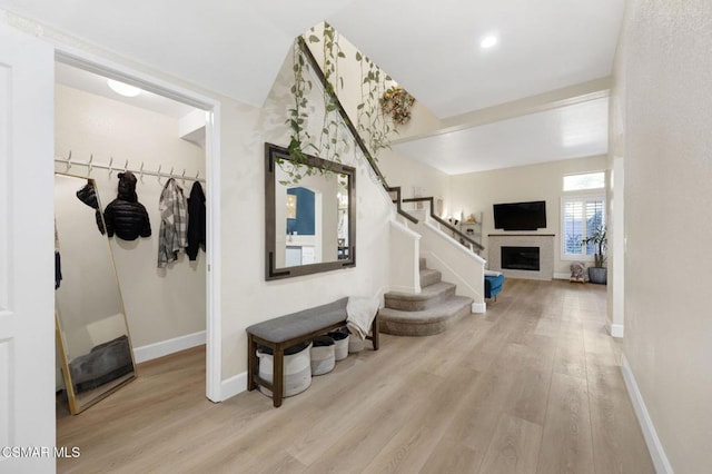 foyer with light hardwood / wood-style floors