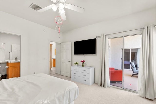 bedroom with light carpet, sink, access to outside, and ceiling fan