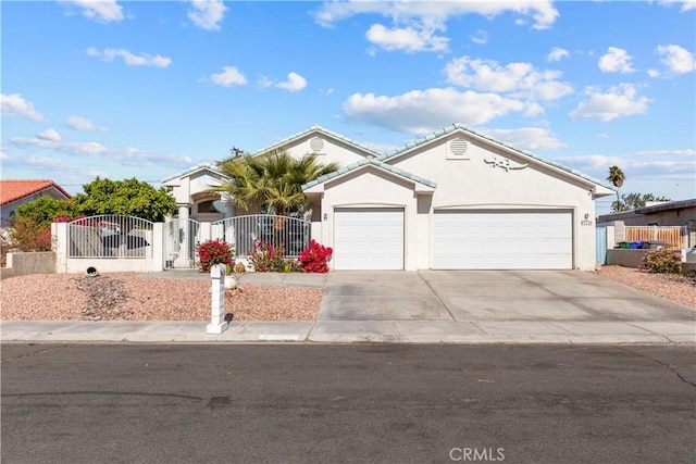 single story home featuring a fenced front yard, a gate, and stucco siding