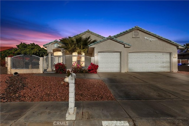 view of front of home with a garage