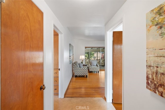 hallway featuring light hardwood / wood-style floors