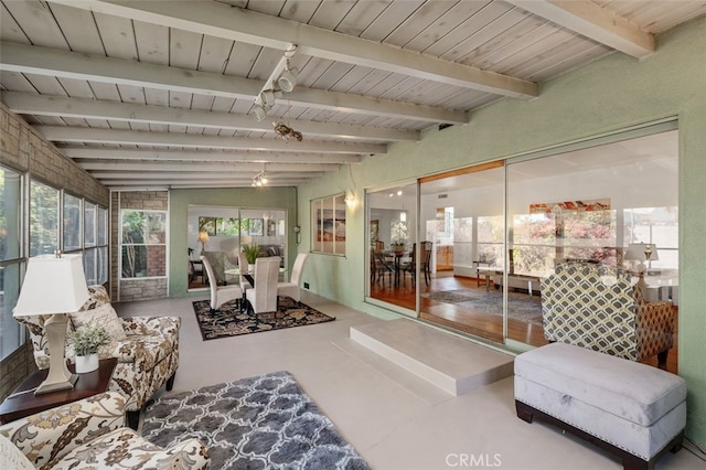 interior space with wooden ceiling and beamed ceiling