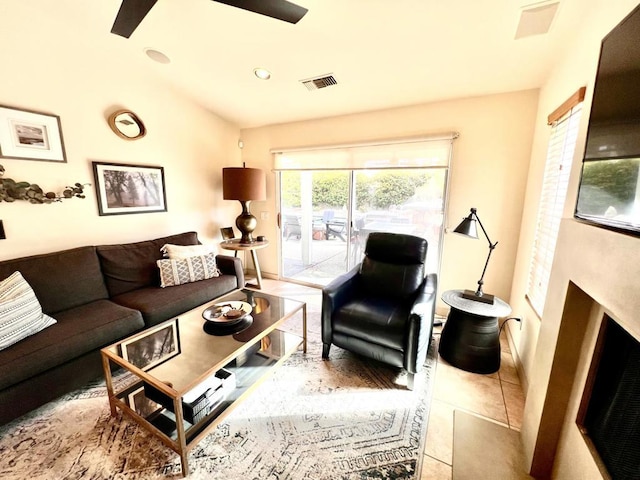 living room with light tile patterned floors