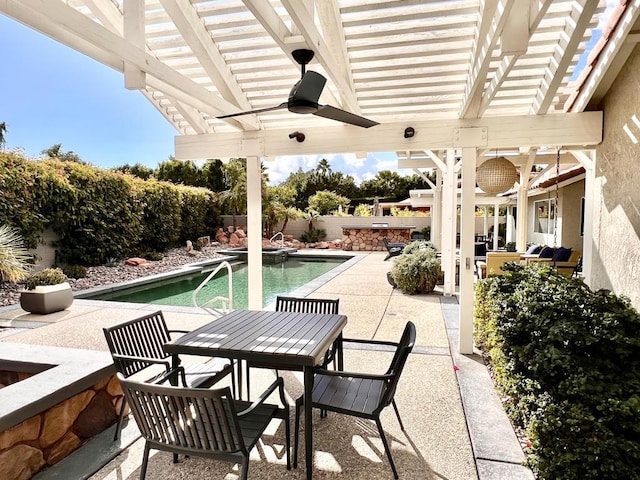 view of patio / terrace with ceiling fan, a pergola, and a fenced in pool