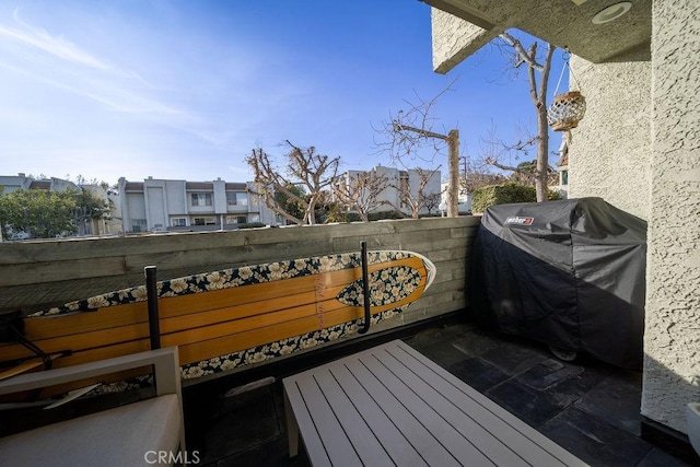 balcony featuring area for grilling