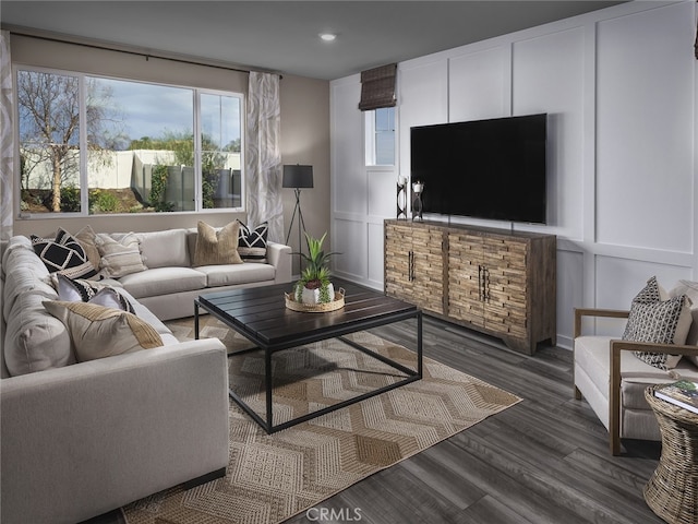 living room with dark hardwood / wood-style flooring