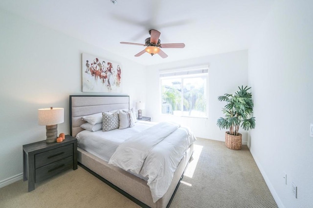 bedroom featuring ceiling fan and carpet flooring