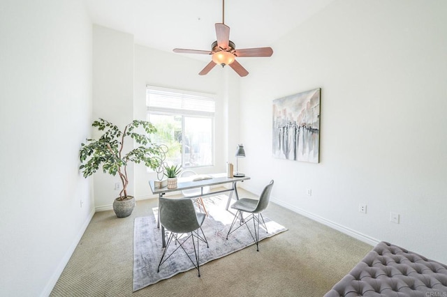 carpeted office with ceiling fan