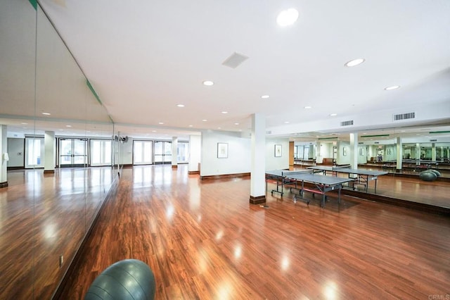 recreation room with hardwood / wood-style flooring