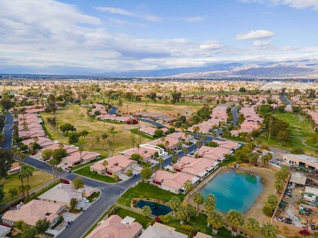 bird's eye view featuring a water and mountain view