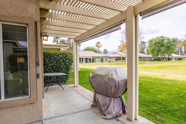 view of patio / terrace featuring a grill and a pergola