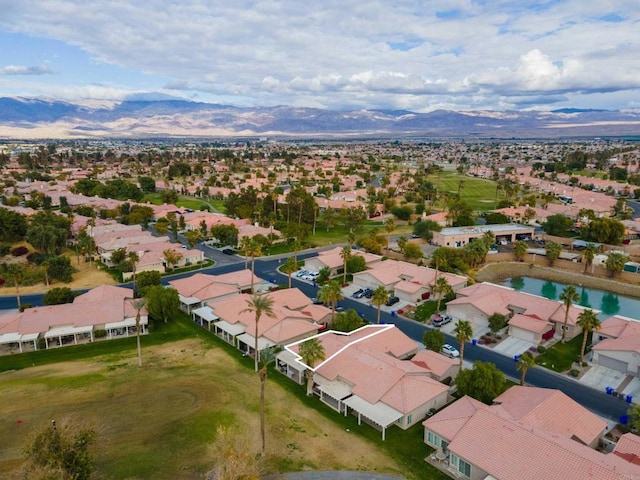 bird's eye view featuring a water and mountain view