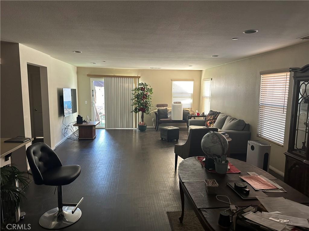 living room featuring dark hardwood / wood-style flooring