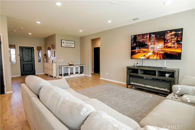 living room featuring light hardwood / wood-style floors