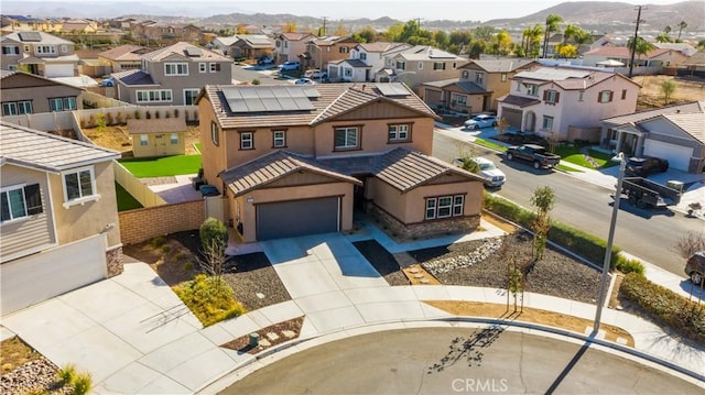 birds eye view of property featuring a mountain view