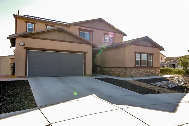 craftsman-style home featuring a garage