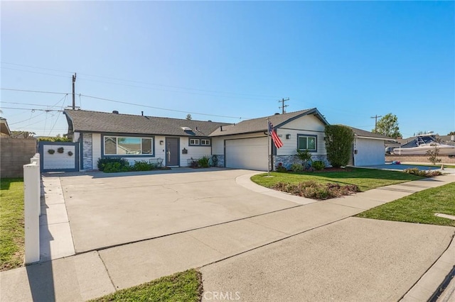 single story home with a garage and a front yard